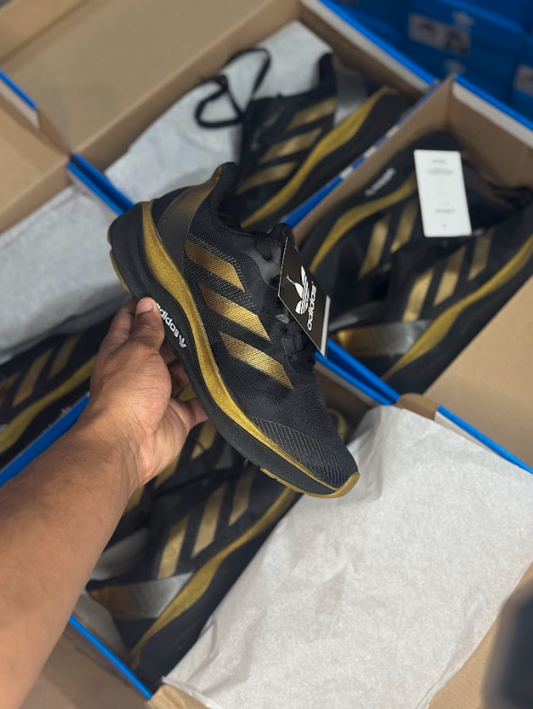 Adizero Preto/Dourado